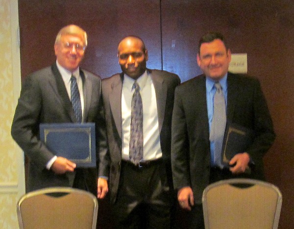 Eric Sloan (c), president, chapter Young AFCEAN Advisory Council, thanks Col. Jim Dendis, USAF (Ret.) (l), and Col. Andrew Pears, USAF (Ret.), for their help in kicking off the 2013 Business Over Breakfast series in March.
