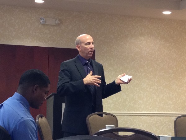 Robert Shofner, Program Executive Officer, business and enterprise systems, Maxwell-Gunter Air Force Base, addresses Young AFCEAN members at the November Business Over Breakfast meeting.
