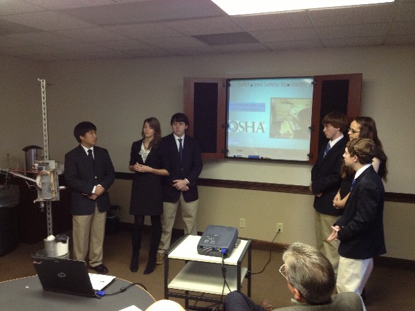 Members of the Wetumpka High School Robotics Team present their ideas to chapter and Montgomery Industry Partners members in November.
