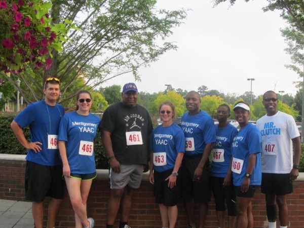 Members of Team Young AFCEAN Advisory Council smile before heading off into the Family Guidance Center 5K and 10K races in September.
