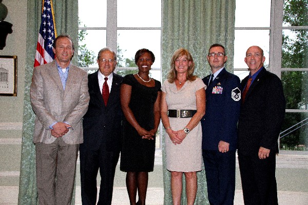 In August, Dr. Joseph Besselman (l), chapter president, and Rober Shofner (r), program executive officer, business enterprise systems, U.S. Air Force, join the chapter in recognizing AFCEA International and chapter award winners (2nd from l-r) Bill Stevenson, Kameke Mitchell, Candace Akerson and Master Sgt. Neil Stewart, USAF.