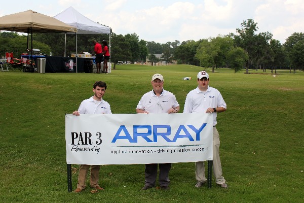 Members of Array Information Technology display signage and prepare to network during the Tom Brantley Annual Charity Golf Tournament. Array was a master level sponsor, donating a total of $7,500 to the Education Foundation via sponsorships. The company's recent AFCEA Information Technology Internship Program participant, Taylor Hopper (far l), assisted Array during the event, and received an invaluable opportunity to network with representatives from over 50 different companies, as well as members of government and the military.