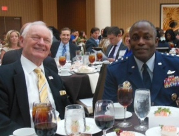 Chuck Corjay (l), a mentor at the chapter's Mentor Protégé Dinner in June, joins the featured speaker, Lt. Gen. Ronnie D. Hawkins Jr., USAF, director, Defense Information Systems Agency.