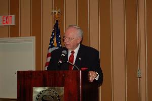 Chuck Corjay, special assistant to the president for chapter affairs, welcomes the scholarship award winners and their families to the scholarship dinner and award presentation, held in July. 