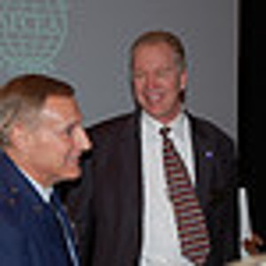 Gen. Basla (l) discusses his presentation with Al Mink, past chapter president, after the October meeting.
