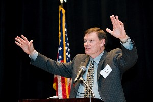 In March, Terry Halvorson, deputy commander, Naval Network Warfare Command, addresses the audience during Naval Information Technology Day.