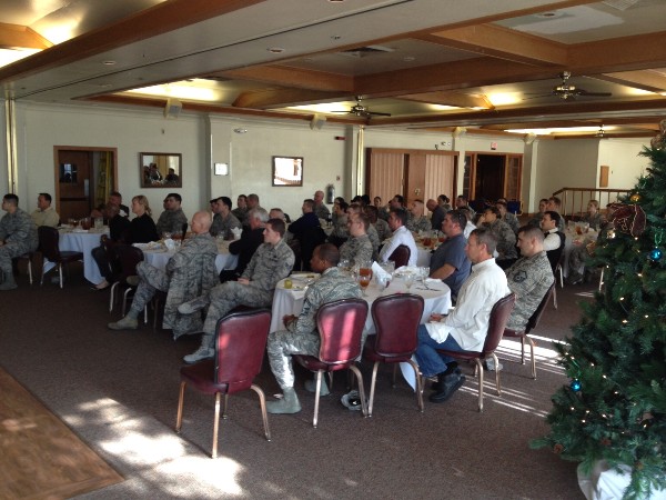 Luncheon attendees gather at Travis Air Force Base in December to hear a presentation on information technology design.