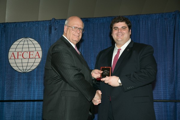 In February, Luke Howe (r) of Sagent Partners received a Distinguished Young AFCEAN Award from Kent R. Schneider, president and chief executive officer, AFCEA International.