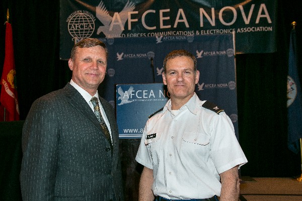 Col. Ken Blakely, USA, commander, Command and Control Support Agency, joins Ron Zich, chapter president, following the colonel’s speech at the March luncheon.