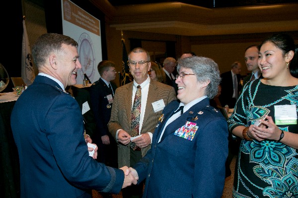 Together at Air Force IT Day in December are speakers Lt. Gen. Burton M. Field, USAF, and Brig. Gen. Linda R. Urrutia-Varhall, USAF.