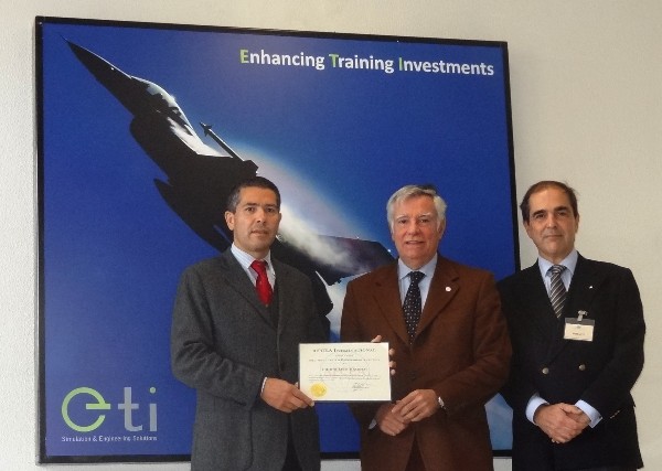 In November, Rear Adm. Carlos Rodolfo, PRT (Ret.) (c), chapter president, presents Carlos Flix (l), chief executive officer, Empordef Tecnologias de Informacao SA (ETI), with a corporate membership certificate in the presence of Maj. Gen. Miguel Rosas Leitao, PRT A (Ret.), chapter vice president.