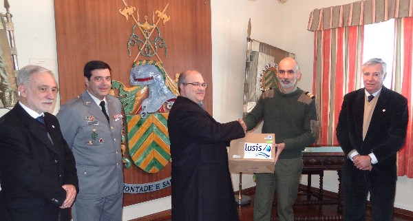 In January, Nuno Paiva (3rd from l), general manager of Lusis, presents Lt. Col. Mario Alvares (2nd from r), PRT AR, educational director of the Portuguese Army Sergeants School (ESE), with equipment to support STEM education there. Others gathering for the presentation are (from l): Rear Adm. Mario Durao, PRT NA (Ret.), chapter president; Col. Pedro Sardinha, PRT AR, commander of ESE; and Rear Adm. Carlos Rodolfo, PRT NA (Ret.), AFCEA director and regional vice president, Atlantic Region. 
