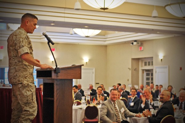 Brig. Gen. Kevin Nally, USMC, director for command, control, communications, and computers (C4) and chief information officer for the Marine Corps, addresses the USMC IT Day audience in April.