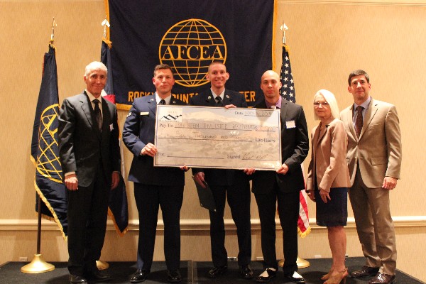 At the May scholarship awards dinner, (l-r) Platt, Airman 1st Class Nicholas Horsley, USAF, Senior Airman Joshua Green, USAF, Staff Sgt. Angelo Tafoya, USAF, Miller and Fellers pose with the Airmen Scholarship check.