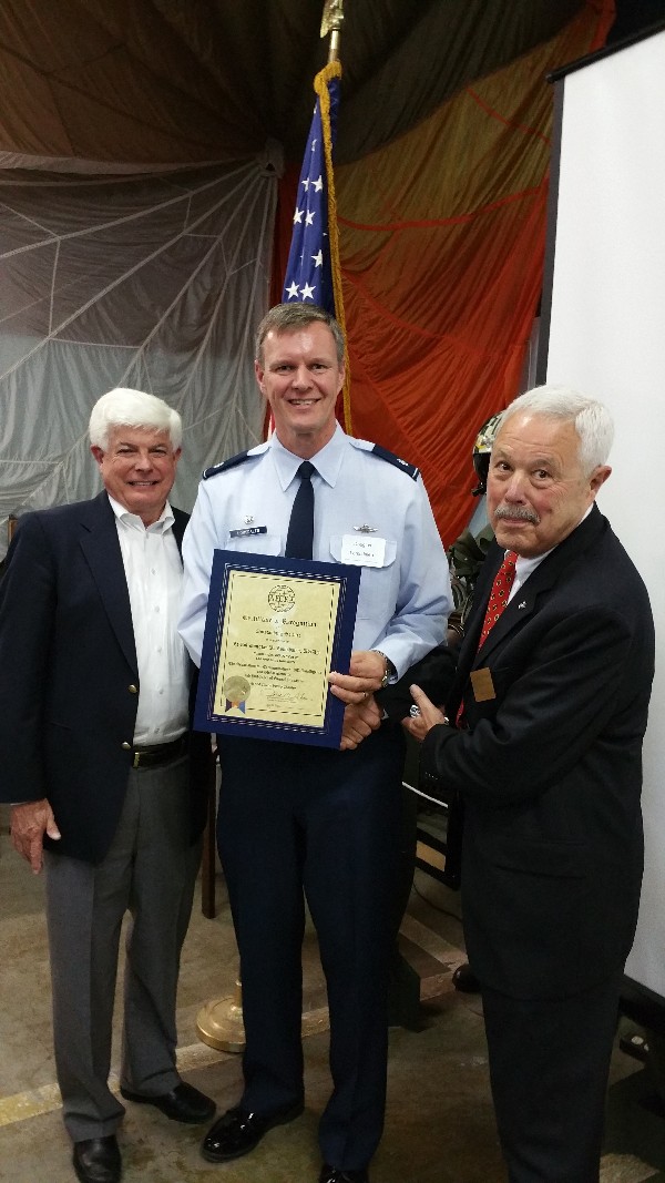 Lt. Col. Douglas Lomsdalen, USAF, commander, Air Force ROTC, Detachment 045 at San Jose State University (c), is honored for outstanding service at a May meeting by Chapter President Bob Moorhead (l) and Bob Landgraf, Northern California regional vice president.
