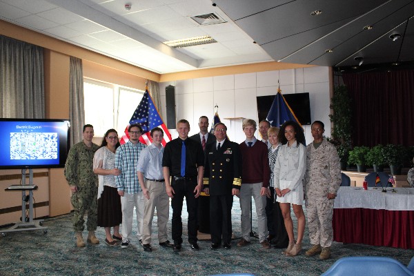 Gathering at the May scholarship presentation are (l-r) Cmdr. and Mrs. Williams with their son Diego Williams, scholarship recipient; Matthew Watson, scholarship recipient; Dyan Rehwaldt, scholarship recipient; Sam Milford, chapter vice president for programs; Vice Adm. Charles Martoglio, USN, deputy commander, U.S. European Command, guest speaker; Olaf Bergeson, scholarship recipient, with his parents; and Morgan Mahlock, scholarship recipient, with her mother, Lt. Col. Mahlock, USMC.