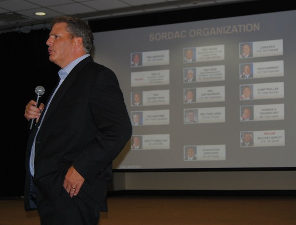 Geurts presents the chapter with information on the Program Executive offices in July.