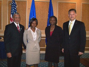 Gathering at the April meeting are (l-r) Will Allen, chapter AFCEAN of the Month for March;Tidewater Science Fair winners Kierra Turner and Jasmine Berry; and Richardson.