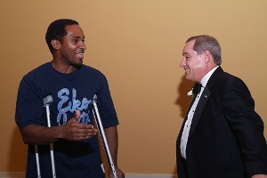 Mike Singer, Winter Gala Committee member (right) chats with one of several injured soldiers from Walter Reed that were invited by the Chapter to attend the Gala.