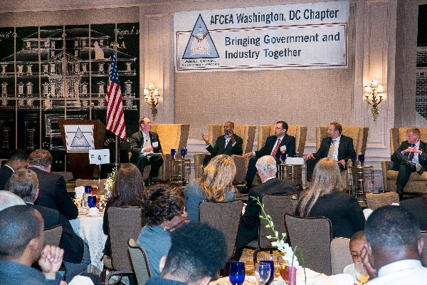 Speaking about the Department of Homeland Security at the chapter's April luncheon are (l-r) Rear Adm. Robert E. Day, USN, moderator; Adrian Gardner, chief information officer (CIO), Federal Emergency Management Agency; Stephen Rice, CIO, Transportation Security Administration; Mark Schwartz, CIO, United States Citizenship and Immigration Services; and Wolf Tombe, chief technology officer, Customs and Border Protection.