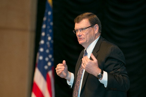 Terry Halvorsen, the Defense Department's chief information officer, speaks to a sold-out crowd at the chapter's Mobility Industry Day in July.