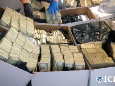 Homeland Security Investigations seized more than $65 million in cash during a multi-agency bust of L.A. fashion industry companies accused of trade-based money laundering tied to Mexican drug cartels in 2014. Credit: U.S. Immigration and Customs Enforcement