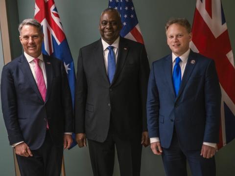 Secretary of Defense Lloyd Austin (c) hosts Richard Marles (l) MP, deputy prime minister and minister of defence, Australia, and the Right Honourable Grant Shapps, secretary of state for defence, United Kingdom at Moffett Field, California, in December 2023. The three leaders met to discuss the Australia-United Kingdom-United States Security Partnership (AUKUS) on the campus of the Defense Innovation Unit. DoD photo by Chad J. McNeeley