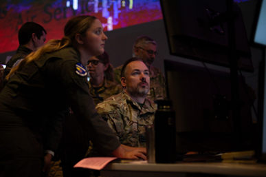 U.S. Air Force Airmen and members of the Royal Air Force participate in the Shadow Operations Center-Nellis Capstone (ShOC-N) experiment event at Nellis Air Force Base, Nevada, Nov. 17-21, 2025. The ShOC-N executed the capstone event to refine tactics, techniques, and procedures for integrated, two-way kill-chain automation across operational and tactical command and control. Credit: U.S. Air Force photo by Airman 1st Class Jennifer Nesbitt