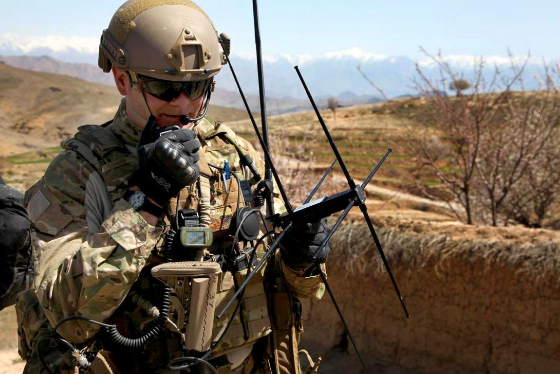 A U.S. Air Force technical sergeant establishes satellite communications with the tactical operations center while on a joint dismounted patrol in Afghanistan. The U.S. Mission Partner Network and the NATO Future Mission Network will expand on the coalition interoperability capabilities the Afghan Mission Network offers.