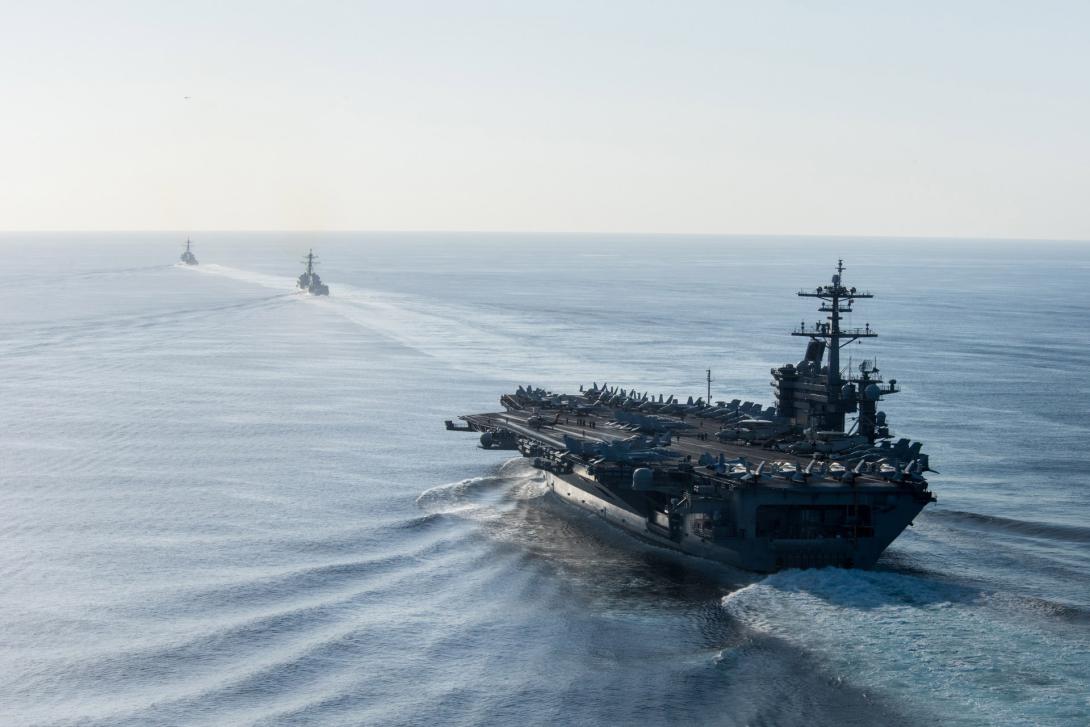 Ships from the USS Theodore Roosevelt carrier strike group participate in a simulated strait transit exercise May 11 in the Pacific Ocean. Photo by Petty Officer 2nd Class Paul Archer, USN