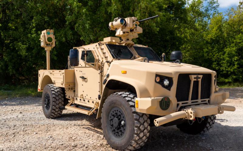 Boeing’s compact laser weapon system, mounted on Oshkosh Defense’s Joint Light Tactical Vehicle (JLTV), could provide counter-unmanned aerial vehicle protection for expeditionary warfighters, the company asserts. Credit: Oshkosh
