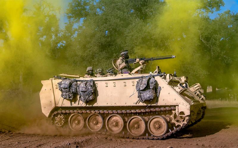 Soldiers travel in an M113 armored personnel carrier during a combat support training exercise. The Army keeps purchases and stores for long periods components of major systems, such as transmissions for M113s, but advances in manufacturing could help the service, and the industrial base, find new ways of sustaining heavy equipment. Credit: Master Sgt. Michel Sauret