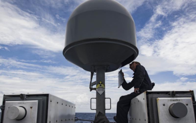 Information Systems Technician 2nd Class Austin Vosburg, USN, performs routine maintenance on the USS Zephyrâ€™s commercial broadband satellite program equipment. The maritime family of SATCOM terminals provides high data rate communications to small and large ships.