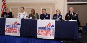 A row of service intelligence chiefs describes today's threats and needed solutions in a panel chaired by (far l) Vice Adm. Jake Jacoby, USN (Ret.). The panelists are (l-r) Vice Adm. Matthew Kohler, USN; Brig. Gen. Dmitri Henry, USMC; Rear Adm. Robert Hayes, USCG;Lt. Gen. VeraLinn “Dash” Jamieson, USAF; and Lt. Gen. Scott Berrier, USA. Photography by Herman Farrer