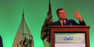 Maj. Gen. Dwyer Dennis, USAF, addresses attendees on the final day of MILCOM 2016 in Baltimore.