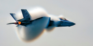 Air Force Capt. Andrew "Dojo" Olson, commander of the F-35 Heritage Flight Team, performs a high-speed pass during the Canadian International Air Show in Toronto, Sept. 1, 2018. The F-35 program office intends to award rapid development contractors to small businesses to rapidly develop and deliver an array of technologies for the aircraft. Photo by Airman 1st Class Alexander Cook