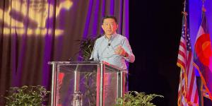 Eng Lim Goh, a senior vice president and chief technology officer, artificial intelligence, at Hewlett Packard Enterprise, addresses the Rocky Mountain Cyberspace Symposium 2022.
