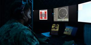 A seaman tracks surface contacts in a simulated combat information center within a virtual operational trainer. The Navy is increasing its focus on virtual training as part of a major push for advanced information warfare.  U.S. Navy photo