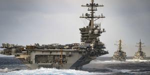 The aircraft carrier USS Theodore Roosevelt transits the Pacific Ocean with the USS Russell and the USS Paul Hamilton. The U.S. Navy is facing several challenges as it strives to modernize its information technology across the breadth of its sea and land assets. U.S. Navy photo