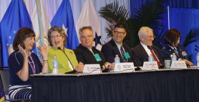 A panel discusses the cyber work force during AFCEA's Defensive Cyber Operations Symposium.