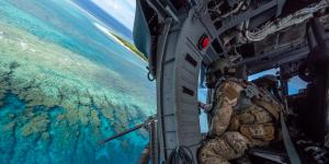 An HH-60G Pave Hawk from the 18th Wing, Kadena Air Base, Japan, flies during a recent recovery training. Any command and control solutions have to reach airmen across the Indo-Pacific region, leaders say. Pacific Air Forces.