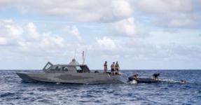 Sailors deployed with the expeditionary mine countermeasures capability of Task Force 75 and Special Warfare Combatant-Craft Crewmen recover a MK 18 Mod 2 unmanned underwater vehicle (UUV) onto a combatant craft in Pago Bay, Guam in November. The Navy is working to add considerable unmanned capability to the fleet with UUVs and unmanned surface vehicles of all sizes to support a number of naval missions. U.S. Navy photo by Petty Officer 1st Class Adam Brock