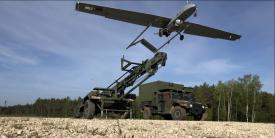U.S. Army soldiers launch an unmanned aerial vehicle (UAV) for surveillance and reconnaissance in Germany. Research by the Intelligence Advanced Research Projects Activity (IARPA) aims to provide UAVs, along with various small handheld devices, with power sources providing twice the energy and 10 times the shelf life of conventional batteries in extreme environments. Credit: U.S. Army photo
