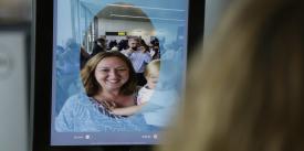 A facial recognition tablet takes a photo of a passenger boarding an international flight during the Sept 2018 launch of a U.S. Customs and Border Protection biometric exit pilot at Dulles International Airport in Virginia. U.S. CBP Photo by Glenn Fawcett