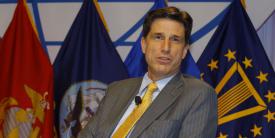 Dana Deasy, the Defense Department’s CIO, pictured speaking at AFCEA’s 2018 Defensive Cyber Operations Symposium in Baltimore, is stressing the role of cloud and artificial intelligence as part of DOD’s new Digital Modernization Strategy. Credit: Michael Carpenter