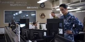 Squadron Leader Jamiee Maika, Royal Australian Air Force, observes operations at the Combined Space Operations Center at Vandenberg Air Force Base, California. This multinational space force includes a strategic defense partnership between the United States, Canada, Australia and the United Kingdom. Additional nations collaborating on space operations with the center include Germany, France and New Zealand. U.S. Space Force photo by Staff Sgt. J.T. Armstrong