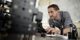 Michael Reimer, assistant professor of electrical and computer engineering at the University of Waterloo, aligns a quantum light source at the universityâ??s Institute for Quantum Computing. Work performed at the institute could lead to quantum radar capable of seeing through high-energy interference as well as detecting stealth aircraft.