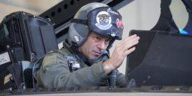 Air Force Lt. Gen. Ken Wilsbach performs preflight procedures in his F-22 Raptor before his final flight as commander of the Alaskan Command, Alaskan North American Aerospace Defense Region and Eleventh Air Force, at Joint Base Elmendorf-Richardson, Alaska, in August 2018. Gen. Wilsbach takes the helm as commander of the Pacific Air Forces, succeeding Gen. Charles Brown, who is moving to be the next chief of the Air Force. Credit: U.S. Air Force photo by Alejandro Peña