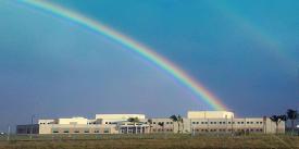A double rainbow looms over the NSA/CSS Center in Oahu, Hawaii. The building is named after Capt. Joseph T. Rochefort, USN, whose team provided the key intelligence that helped win the 1942 Battle of Midway. The agency is looking to industry and academia for innovations vital to its changing mission. Credit: NSA/CSS