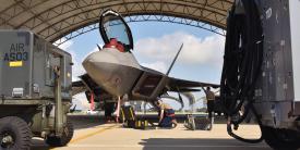 U.S. Air Force Airmen prepare an F-22 Raptor for takeoff at Joint Base Langley-Eustis, Virginia, in September. The Air Combat Command is taking steps to ready the Air Force for multidomain operations. U.S. Air Force photo by Airman 1st Class Sarah Dowe